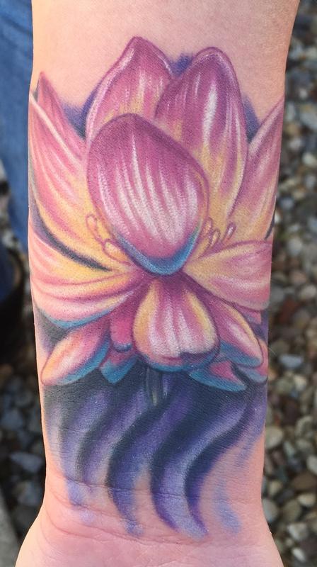 Lotus flower cover up tattoo