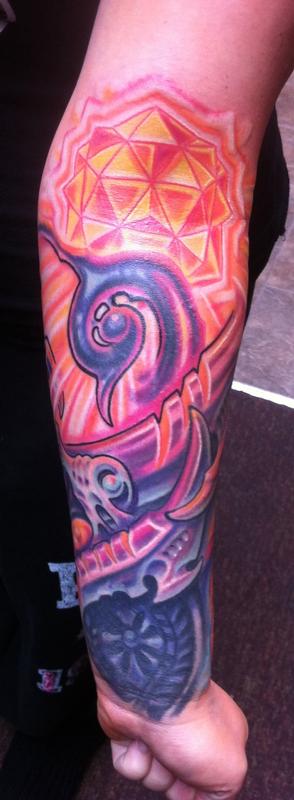 Feminine glowing biomech coverup