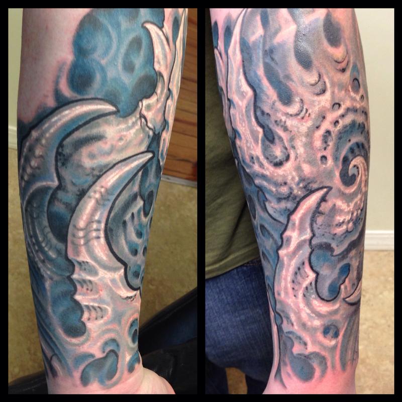 Biomech arm tattoo