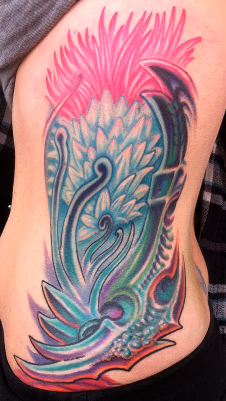 Flower rib tattoo