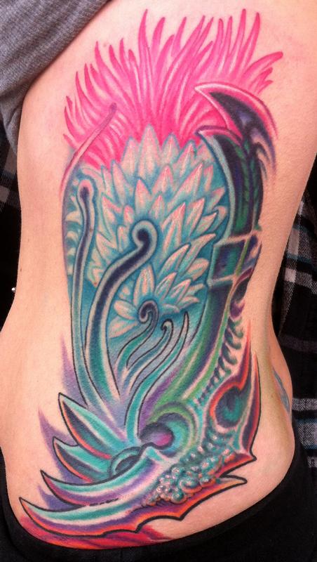 Flower rib tattoo