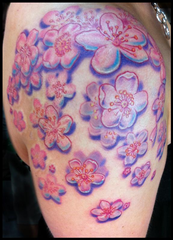 Cluster of cherry blossoms tattoo