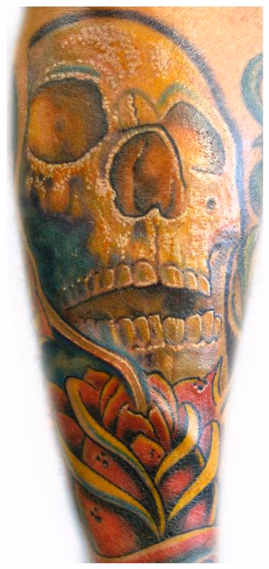 Skull and rose tattoo