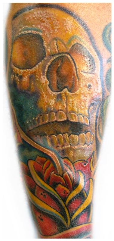 Skull and rose tattoo