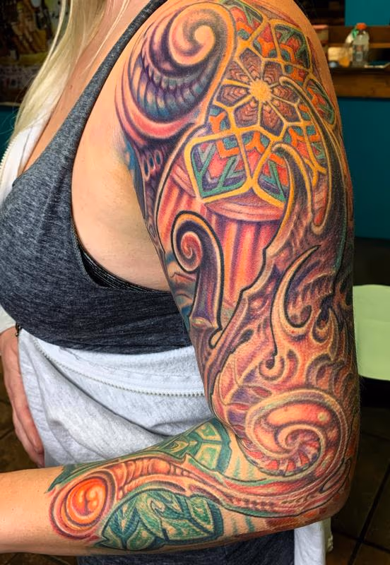 Feminine bio sleeve tattoo