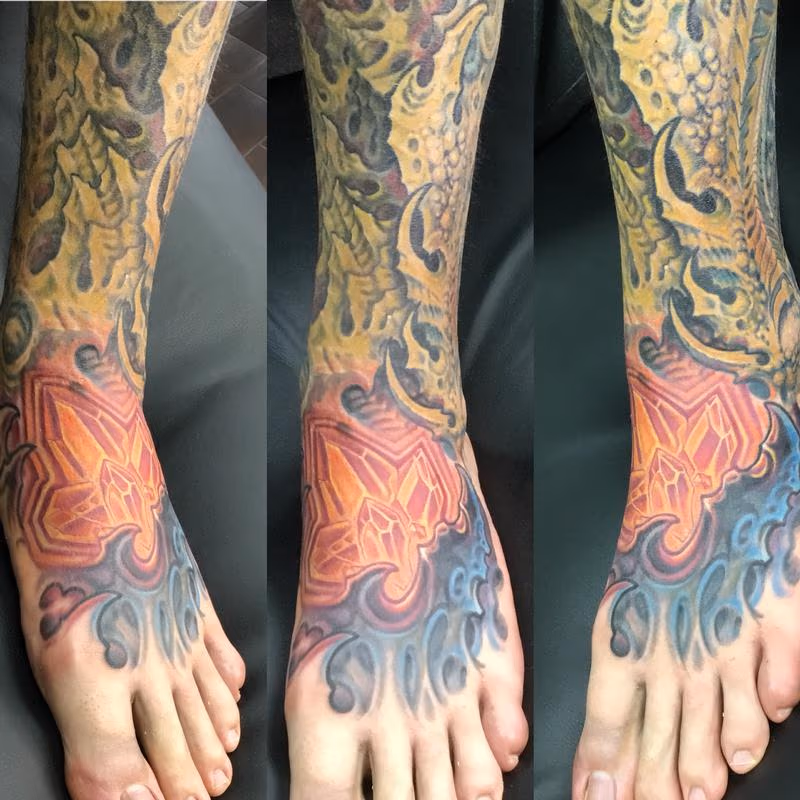 Biomech and crystal tattoo