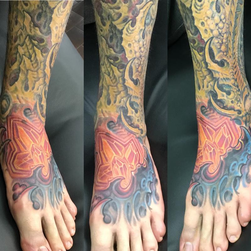 Biomech and crystal tattoo