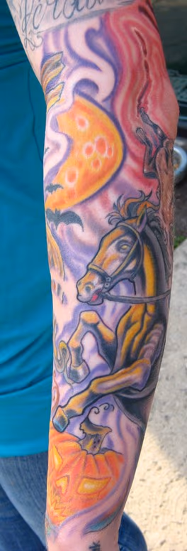 Another view of Tara's halloween tattoo. color halloween pumpkin tattoo