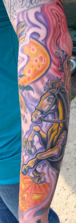 Another view of Tara's halloween tattoo. color halloween pumpkin tattoo