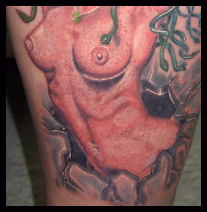 Here is a fun titty pic of an in progress tattoo of Medusa. I sure do love tattooing them..