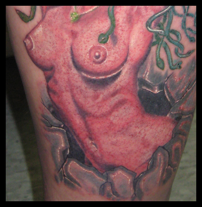 Here is a fun titty pic of an in progress tattoo of Medusa. I sure do love tattooing them..