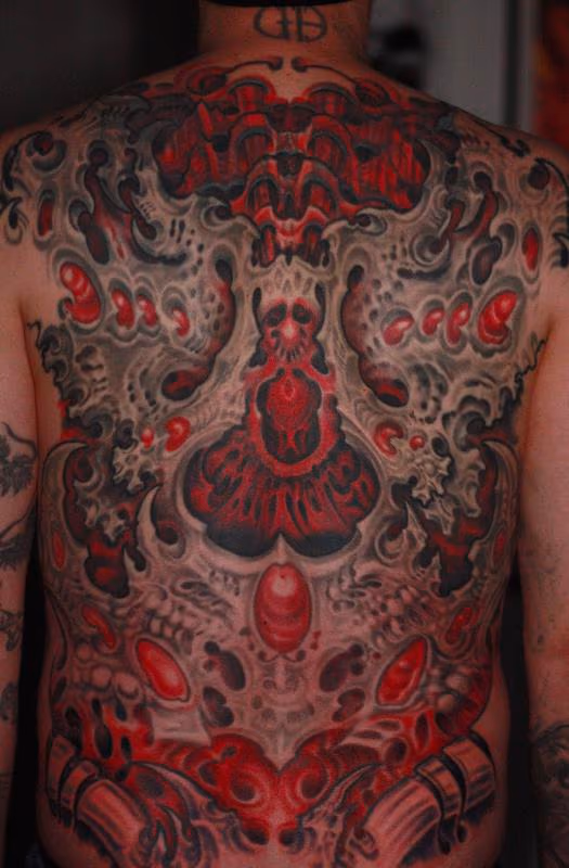Biomech back tattoo