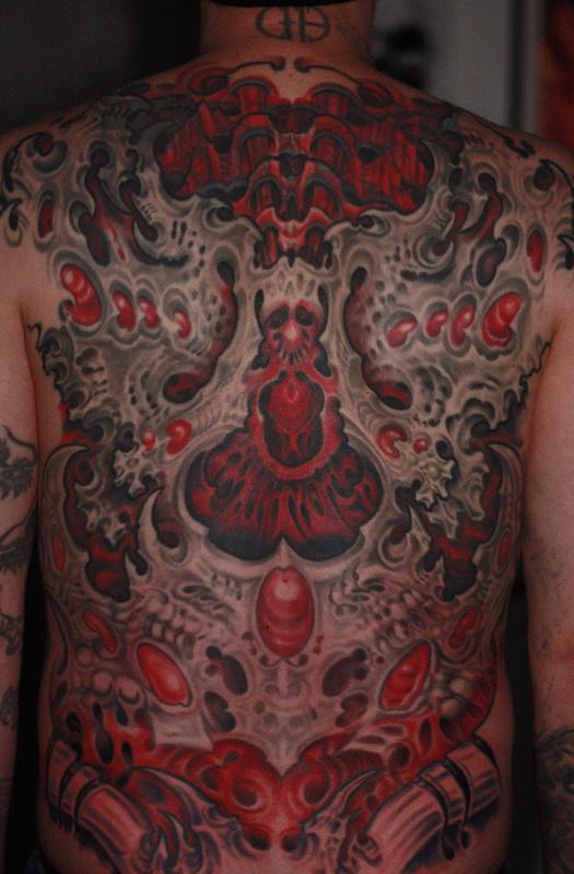 Biomech back tattoo
