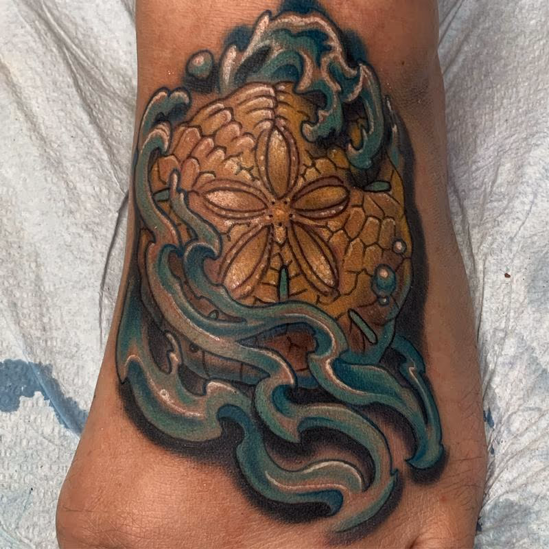 Seashell tattoo