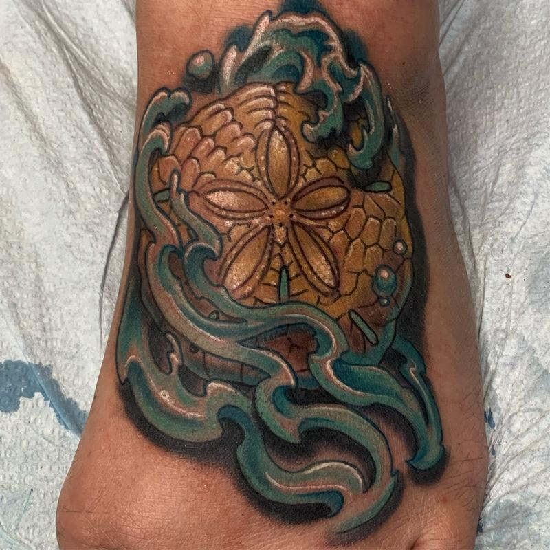Seashell tattoo