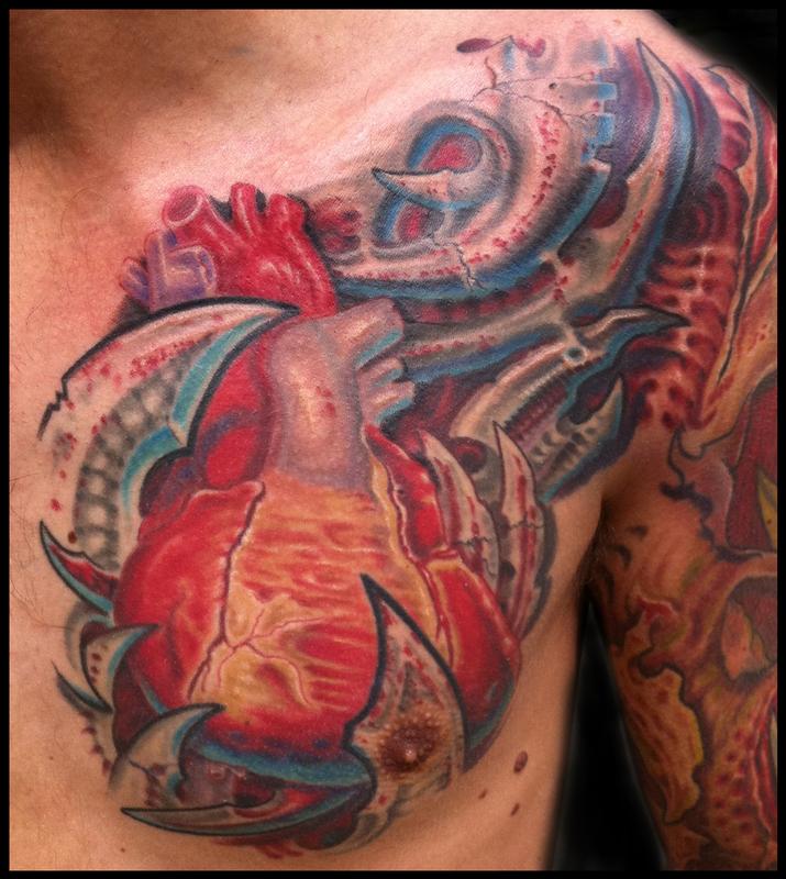 anatomical heart and bio mech tattoo