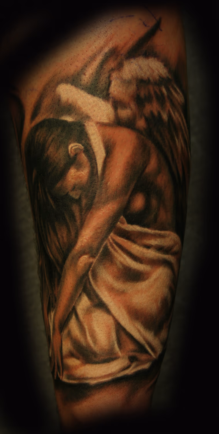Praying angel tattoo