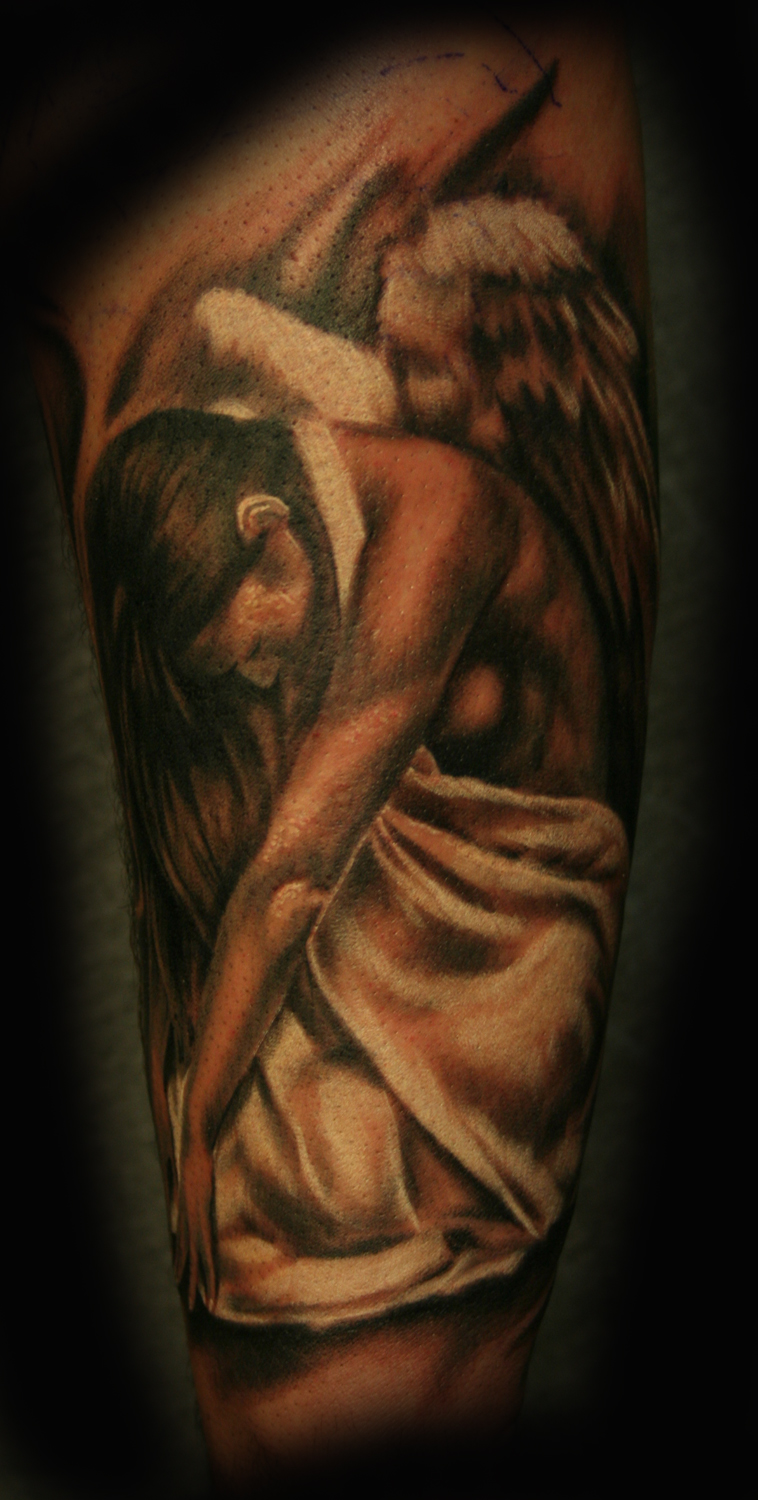 Praying angel tattoo