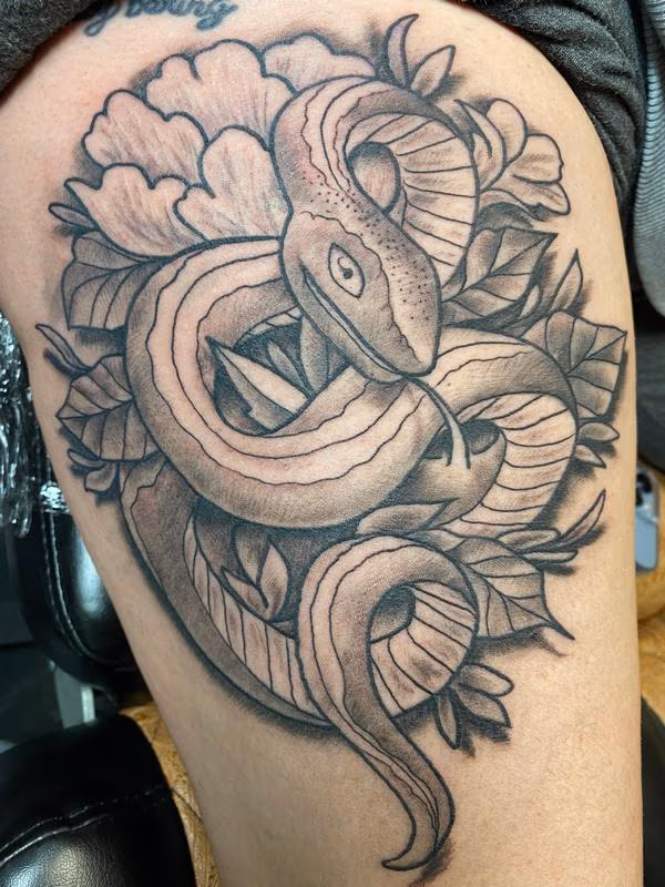 Illustrative Snake and Flower Tattoo