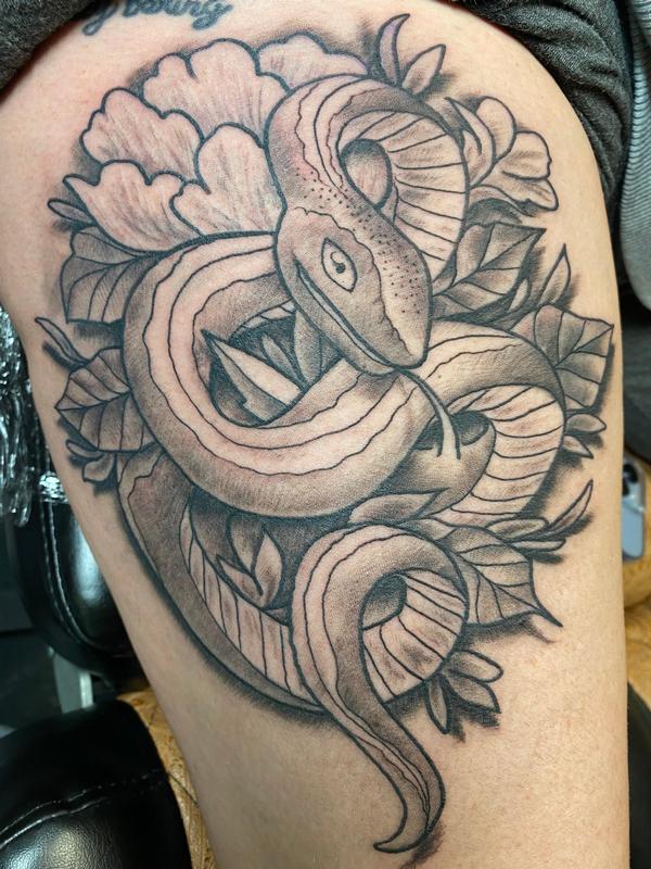Illustrative Snake and Flower Tattoo
