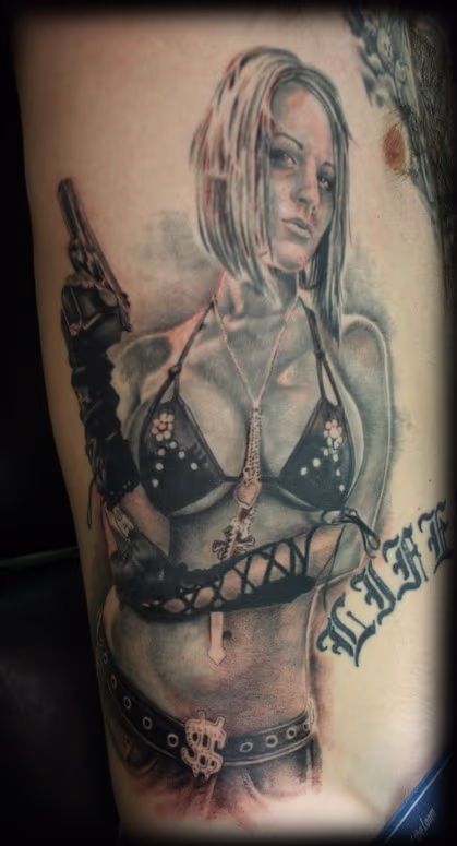 Girl with a Gun Tattoo