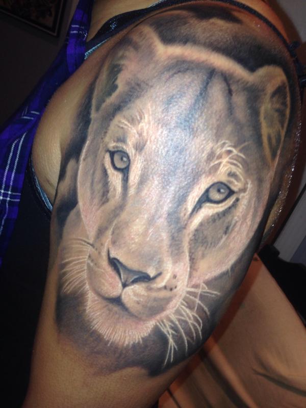 Lioness portrait tattoo