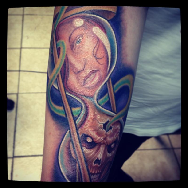 Good versus Evil Hourglass color tattoo