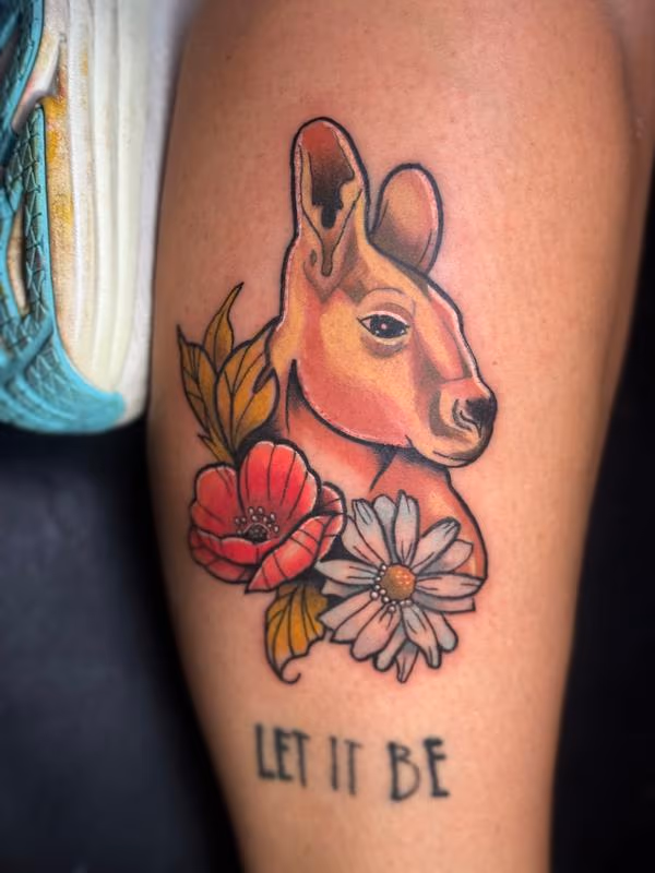 Kangaroo and flowers tattoo by @ness_tat2