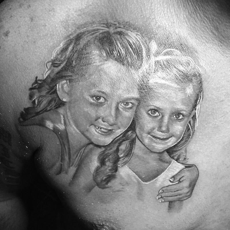 Black and Grey Portrait Tattoo