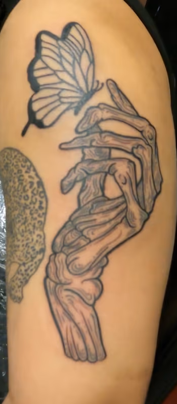 Butterfly Skeleton Hand Tattoo