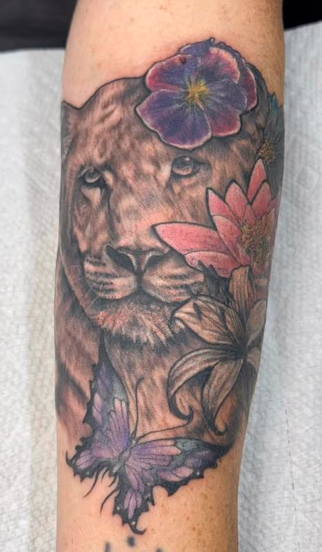 Lioness with Flowers by @nicktattoo_baltimore