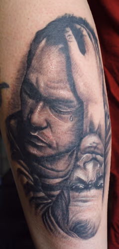 Ledger with Joker tattoo