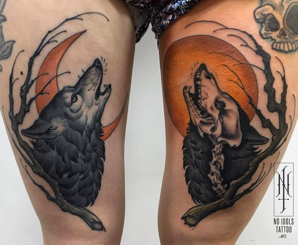 Howling wolf and moon tattoo