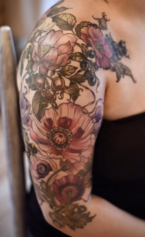 vintage poppy rose hip tattoo
