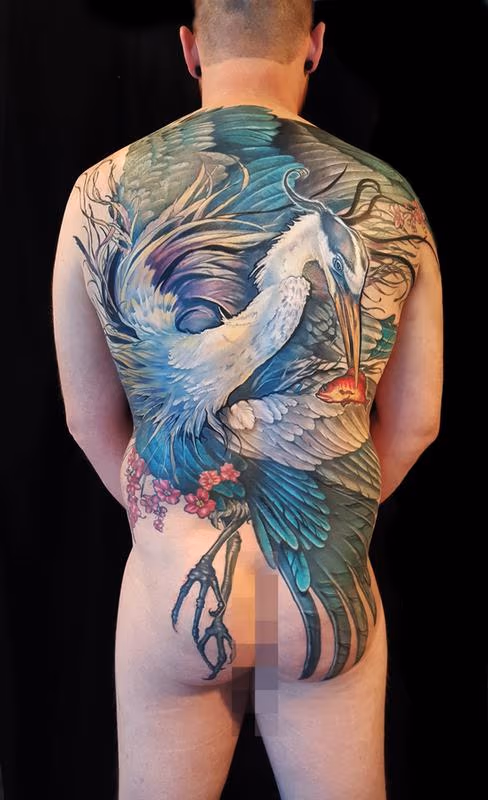 great blue heron back piece tattoo