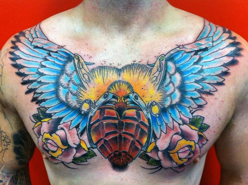 freehand chest piece grenade heart wings