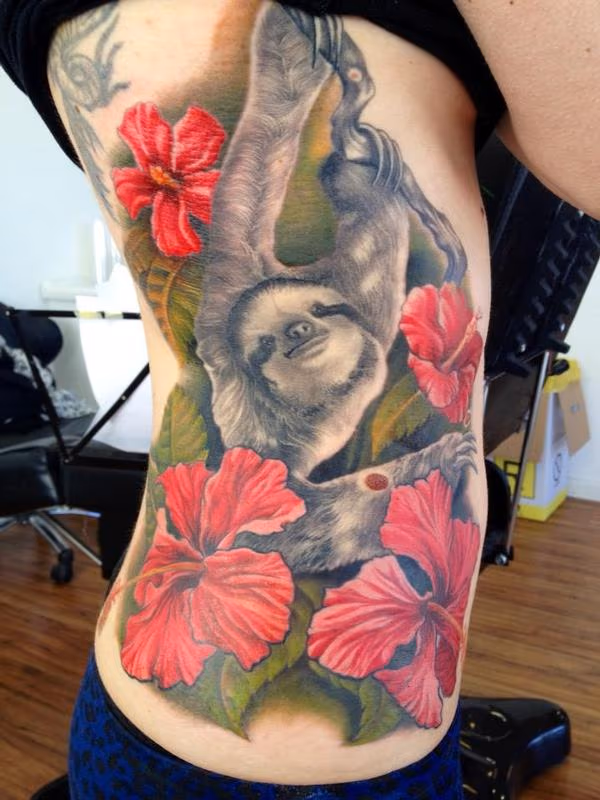 michele@offthemaptattoo.com, Sloth with ibiscus