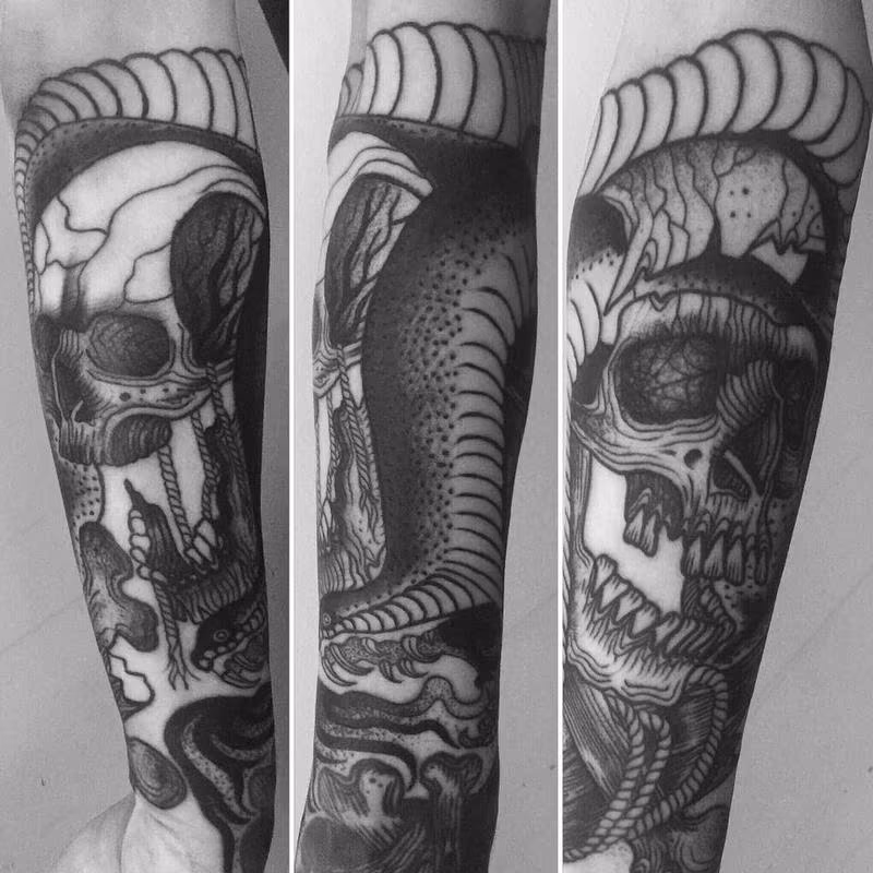 snake and skulls
