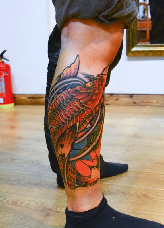 Koi Fish and Lotus Blossom Rippling Reflection