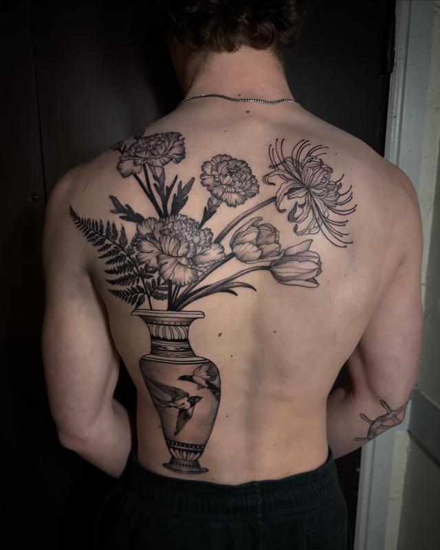 Black and grey vase with fine line florals