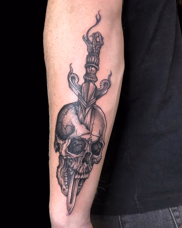 Brennan Walker Skull and Dagger Tattoo