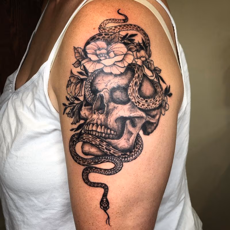 Brennan Walker Skull, Snake and Flower Tattoo