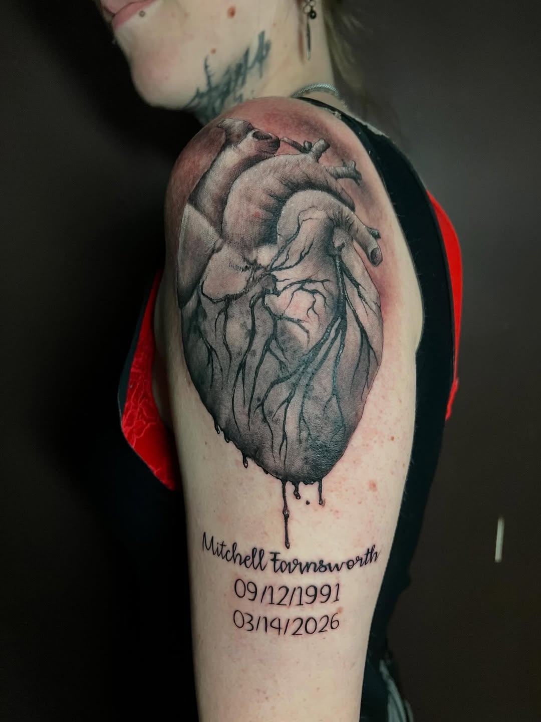 Anatomical heart memorial tattoo on shoulder