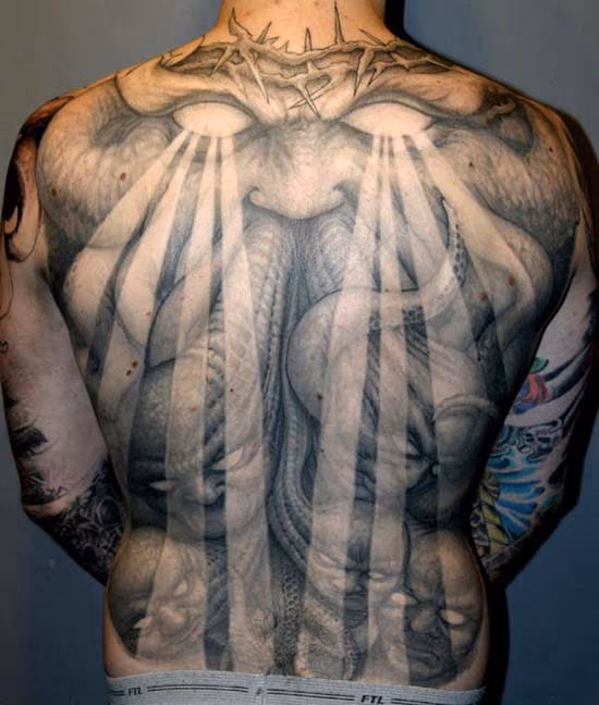 Crown of thorns demon back piece tattoo