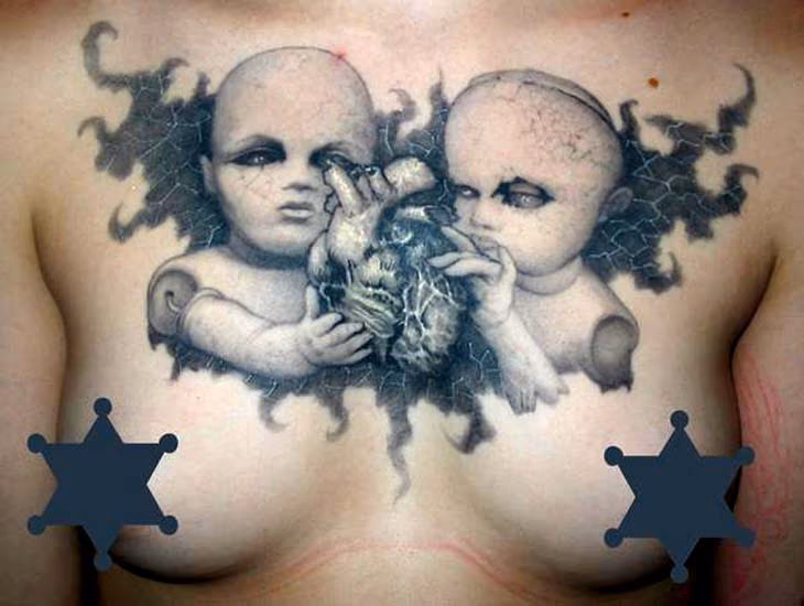 Dolls with anatomical heart chest tattoo