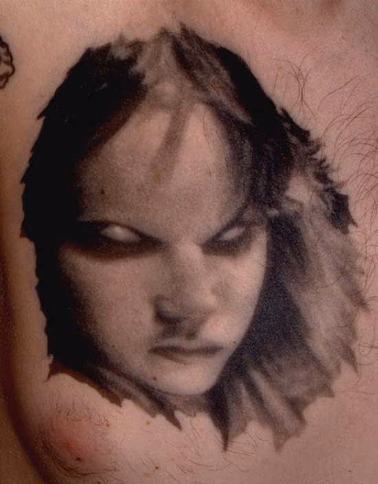 Creepy black and gray girl portrait tattoo