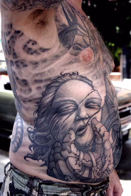 Severed head tattoo