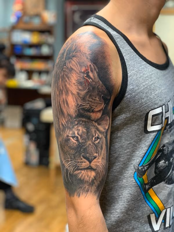 Lion with liones tattoo