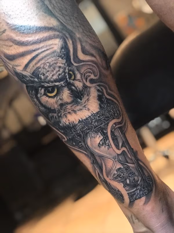 owl with hourglass tattoo