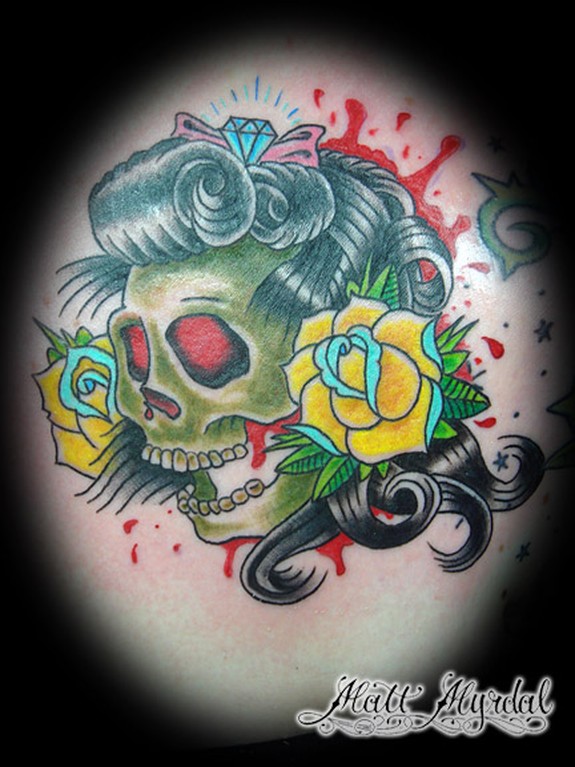 Skull with roses and a diamond bow.